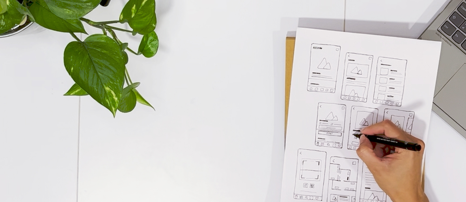 Paper wireframe sketches of the Artura app screens